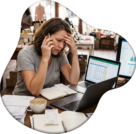 Business owner buried in bookkeeping