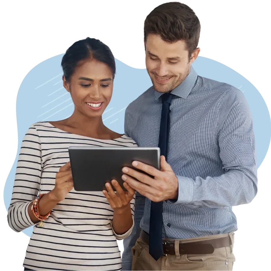 Two professionals reviewing information on a tablet together